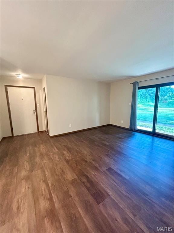 4278 Kay Ln Unit 2, Saint Louis, MO 63123 - unfurnished room with dark wood-type flooring and baseboards