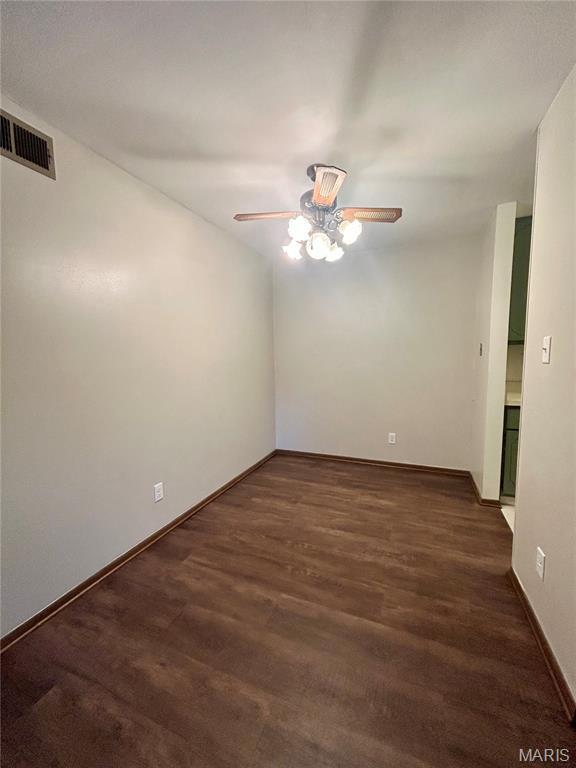 4278 Kay Ln Unit 2, Saint Louis, MO 63123 - spare room with a ceiling fan and wood finished floors