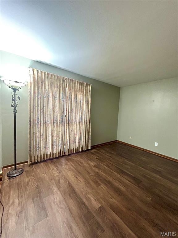 4278 Kay Ln Unit 2, Saint Louis, MO 63123 - empty room featuring wood finished floors and baseboards
