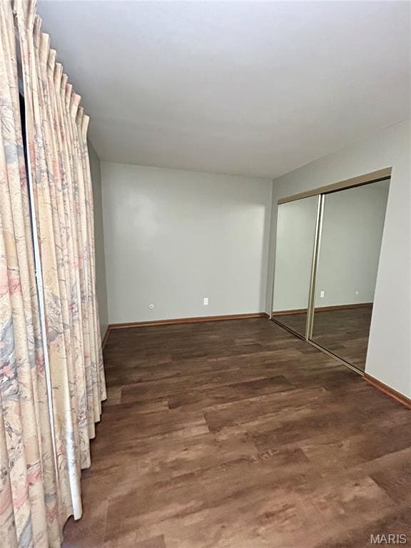 4278 Kay Ln Unit 2, Saint Louis, MO 63123 - unfurnished bedroom with a closet and wood finished floors
