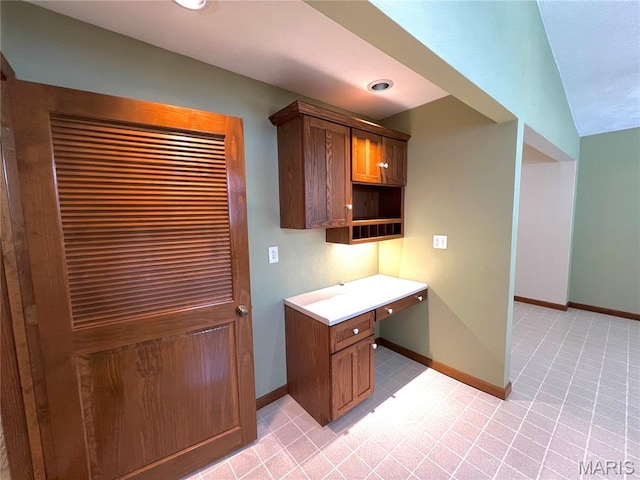 138 S 33rd St, Belleville, IL 62226 - kitchen featuring light countertops and light tile patterned flooring