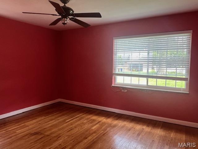 6721 Itaska St, Saint Louis, MO 63109 - empty room featuring wood finished floors and a ceiling fan