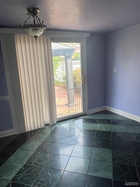 6721 Itaska St, Saint Louis, MO 63109 - spare room with baseboards