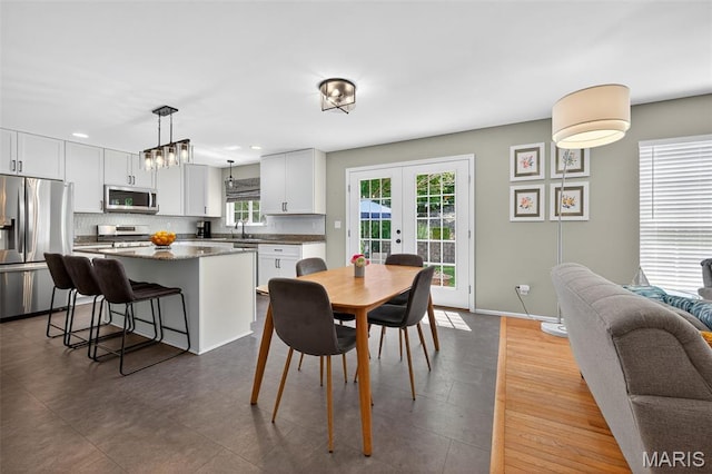 2426 Guardian Ct, Arnold, MO 63010 - dining space featuring french doors and recessed lighting