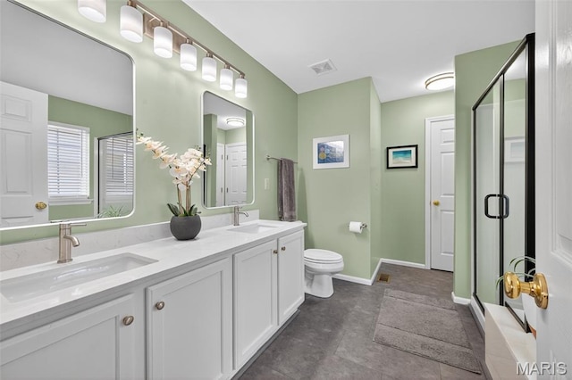 2426 Guardian Ct, Arnold, MO 63010 - bathroom featuring double vanity, a stall shower, and tile patterned flooring