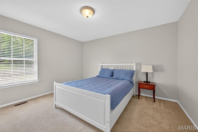 2426 Guardian Ct, Arnold, MO 63010 - carpeted bedroom featuring baseboards