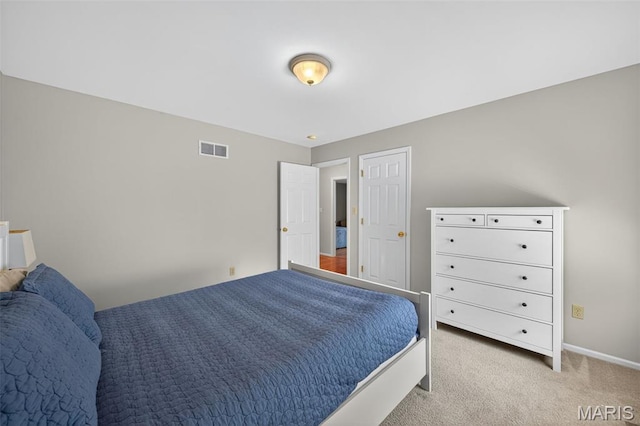 2426 Guardian Ct, Arnold, MO 63010 - bedroom featuring light colored carpet and baseboards
