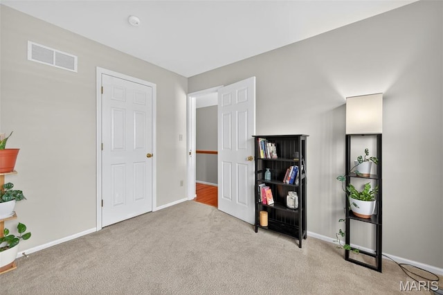 2426 Guardian Ct, Arnold, MO 63010 - sitting room featuring carpet floors and baseboards