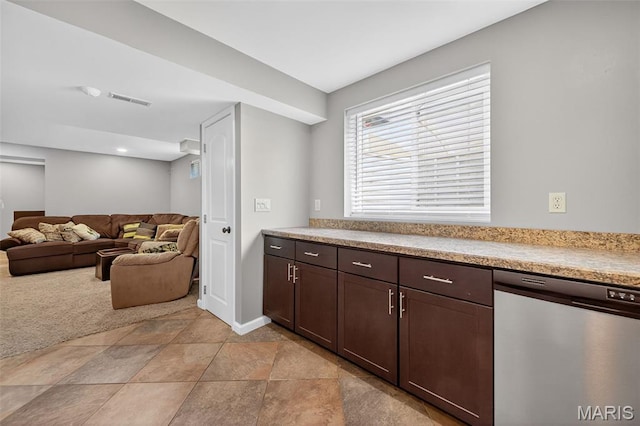 2426 Guardian Ct, Arnold, MO 63010 - kitchen with dishwasher, dark brown cabinets, light countertops, and open floor plan