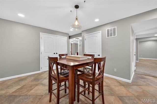 2426 Guardian Ct, Arnold, MO 63010 - dining space with light stone finish floors and recessed lighting