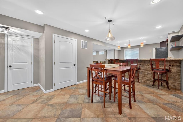 2426 Guardian Ct, Arnold, MO 63010 - dining space with stone tile flooring and recessed lighting