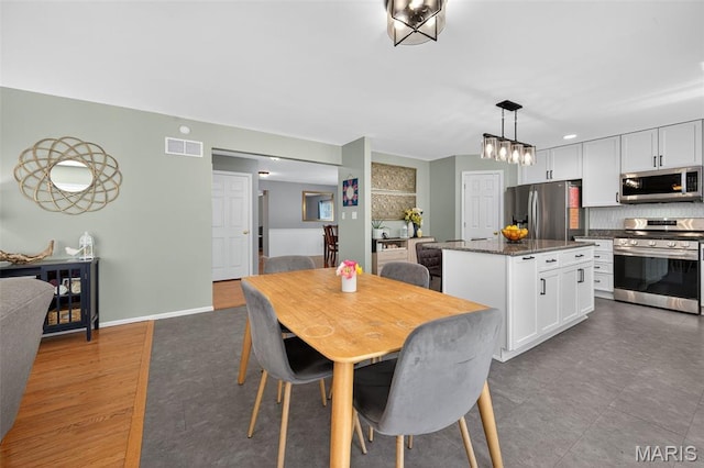 2426 Guardian Ct, Arnold, MO 63010 - dining room with baseboards