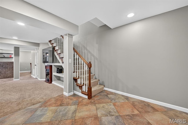 2426 Guardian Ct, Arnold, MO 63010 - staircase featuring stone finish floors, carpet floors, and recessed lighting
