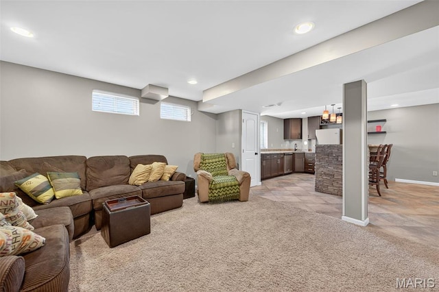 2426 Guardian Ct, Arnold, MO 63010 - living area with light colored carpet, bar, and recessed lighting