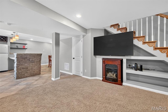 2426 Guardian Ct, Arnold, MO 63010 - unfurnished living room with a bar, stairs, carpet flooring, and recessed lighting