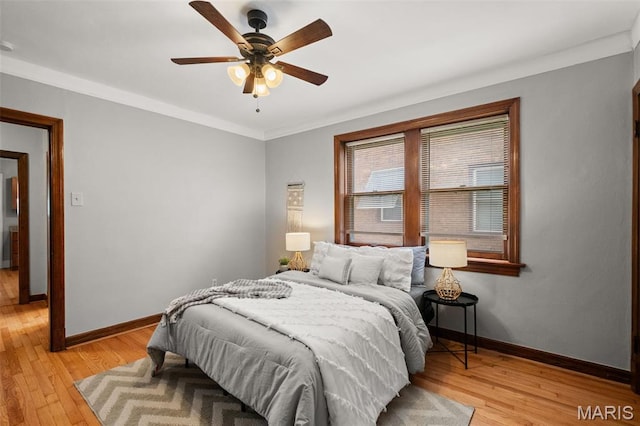 4932 Fairview Ave, Saint Louis, MO 63139 - bedroom featuring light wood finished floors, ornamental molding, and ceiling fan