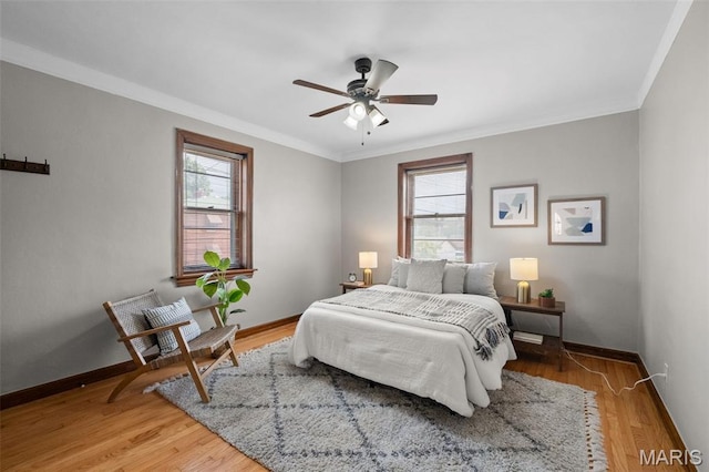 4932 Fairview Ave, Saint Louis, MO 63139 - bedroom featuring ornamental molding, light wood-style floors, and a ceiling fan