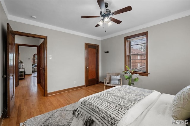 4932 Fairview Ave, Saint Louis, MO 63139 - bedroom featuring light wood-style floors, ornamental molding, and a ceiling fan