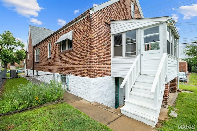 4932 Fairview Ave, Saint Louis, MO 63139 - view of side of home with brick siding