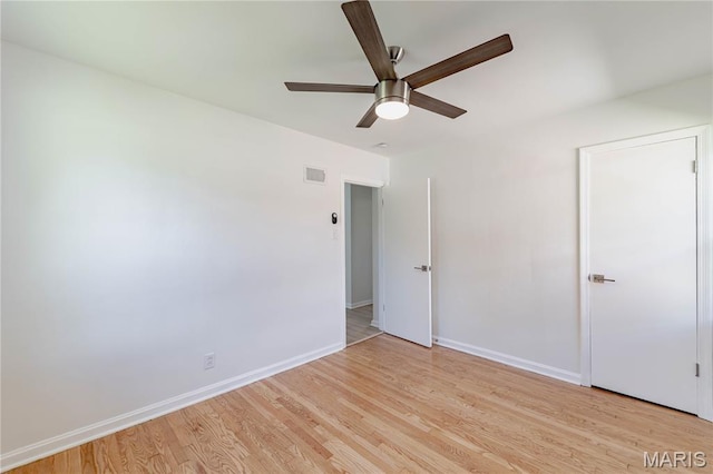 7315 Cheshire Ln, Affton, MO 63123 - unfurnished bedroom with light wood-type flooring and a ceiling fan