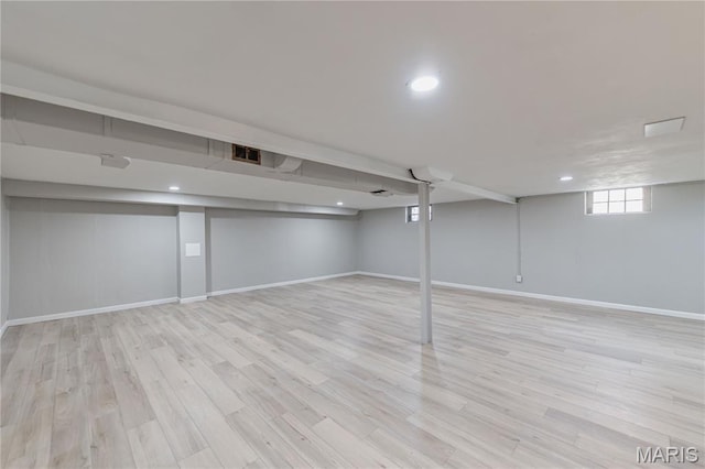 7315 Cheshire Ln, Affton, MO 63123 - basement with light wood finished floors and recessed lighting