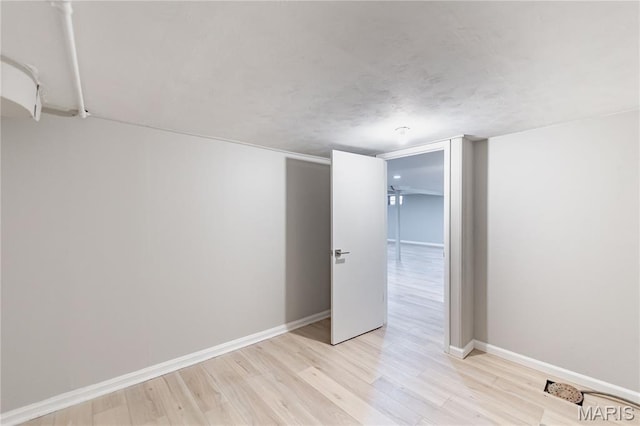 7315 Cheshire Ln, Affton, MO 63123 - spare room featuring light wood-style floors and baseboards