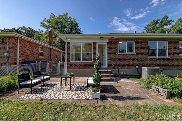 7315 Cheshire Ln, Affton, MO 63123 - rear view of property with brick siding and a patio area