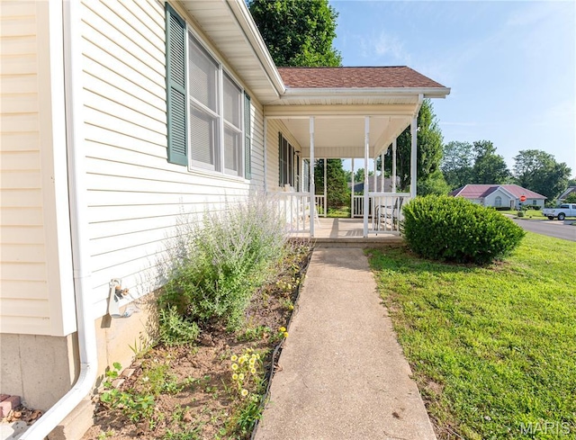 921 Mallard Sq, Rolla, MO 65401 - view of property exterior with covered porch and a shingled roof