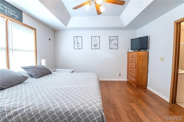 921 Mallard Sq, Rolla, MO 65401 - bedroom with a raised ceiling, wood finished floors, and a ceiling fan