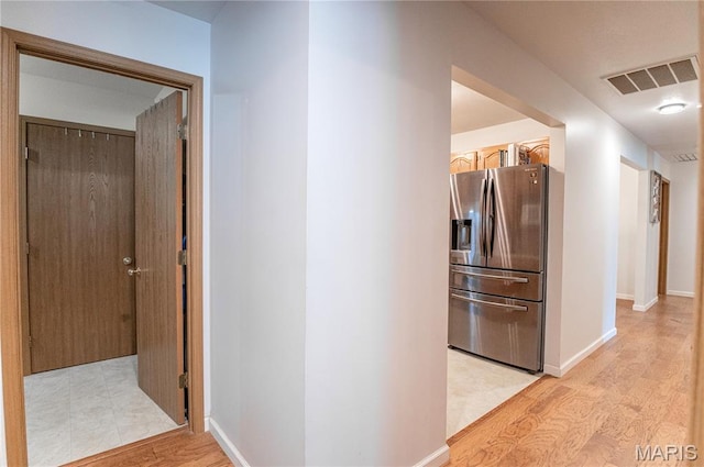 921 Mallard Sq, Rolla, MO 65401 - corridor with light wood-type flooring and baseboards