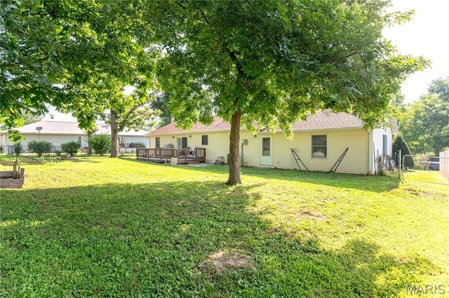 921 Mallard Sq, Rolla, MO 65401 - fenced backyard featuring a wooden deck