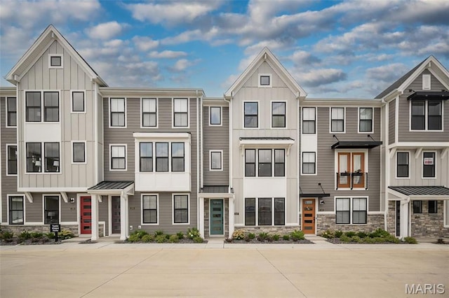 1347 W Gateway Hts W Unit 53-603, Richmond Heights, MO 63144 - multi unit property with stone siding and board and batten siding