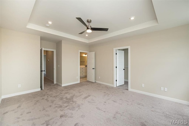 1347 W Gateway Hts W Unit 53-603, Richmond Heights, MO 63144 - unfurnished bedroom with a raised ceiling, recessed lighting, light carpet, and ensuite bath