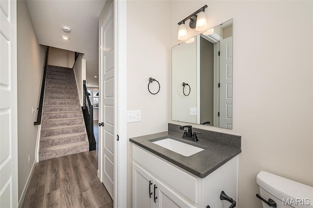 1347 W Gateway Hts W Unit 53-603, Richmond Heights, MO 63144 - bathroom with vanity and wood finished floors