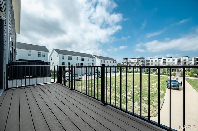 1347 W Gateway Hts W Unit 53-603, Richmond Heights, MO 63144 - deck featuring a residential view and a yard