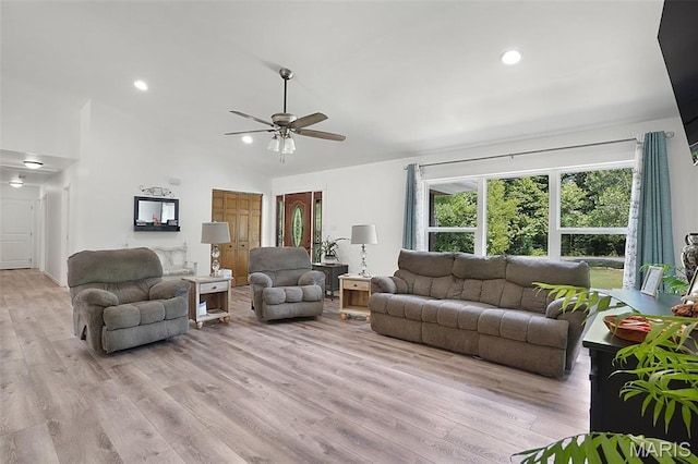 8224 Wild Acre Meadows Dr, Hillsboro, MO 63050 - living area with plenty of natural light, light wood-style flooring, ceiling fan, vaulted ceiling, and recessed lighting