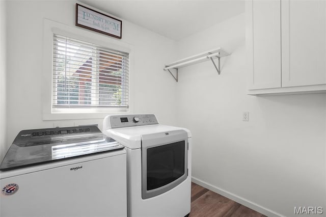 8224 Wild Acre Meadows Dr, Hillsboro, MO 63050 - washroom with washer and dryer, wood finished floors, and cabinet space
