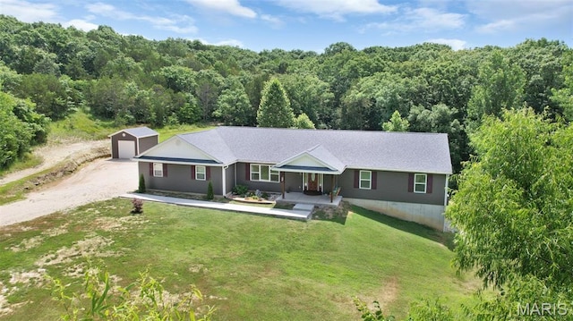 8224 Wild Acre Meadows Dr, Hillsboro, MO 63050 - ranch-style house featuring an outbuilding, a front lawn, dirt driveway, and a wooded view