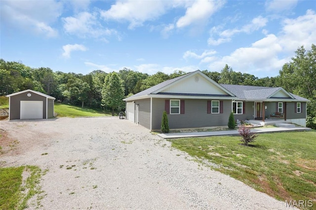 8224 Wild Acre Meadows Dr, Hillsboro, MO 63050 - ranch-style house with a garage, a front lawn, an outdoor structure, driveway, and a porch