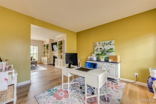 3026 Windsor Point Dr, Saint Louis, MO 63129 - office featuring light wood finished floors and a fireplace