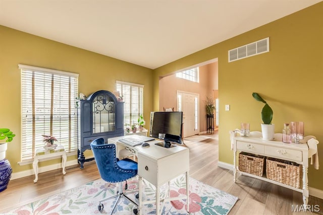 3026 Windsor Point Dr, Saint Louis, MO 63129 - home office with light wood finished floors and baseboards