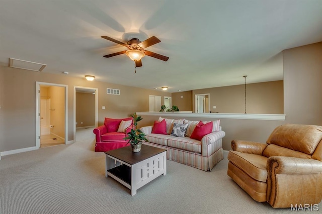 3026 Windsor Point Dr, Saint Louis, MO 63129 - living area with ceiling fan and light colored carpet