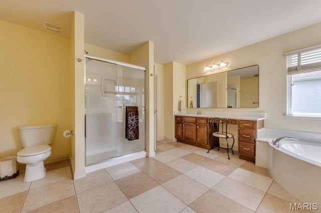 3026 Windsor Point Dr, Saint Louis, MO 63129 - bathroom featuring a shower stall, vanity, a garden tub, and tile patterned floors