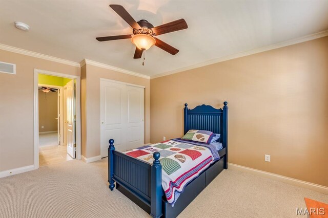 3026 Windsor Point Dr, Saint Louis, MO 63129 - bedroom with ornamental molding, carpet floors, a closet, and a ceiling fan