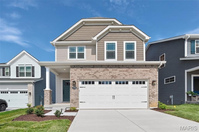 554 Wheatfield Cir, Ofallon, MO 63385 - craftsman inspired home with brick siding, a garage, and driveway