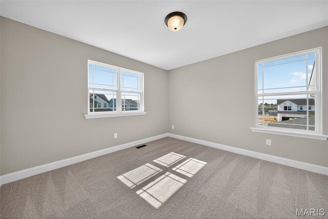 554 Wheatfield Cir, Ofallon, MO 63385 - carpeted spare room with baseboards