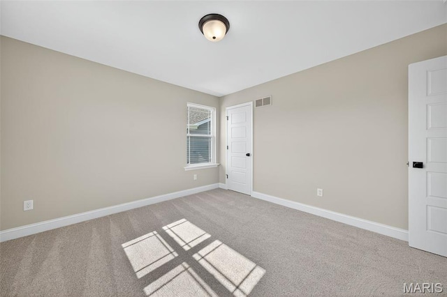 554 Wheatfield Cir, Ofallon, MO 63385 - unfurnished room featuring carpet and baseboards