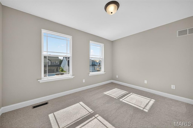 554 Wheatfield Cir, Ofallon, MO 63385 - empty room with carpet flooring and baseboards