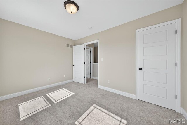554 Wheatfield Cir, Ofallon, MO 63385 - unfurnished bedroom featuring carpet flooring and baseboards