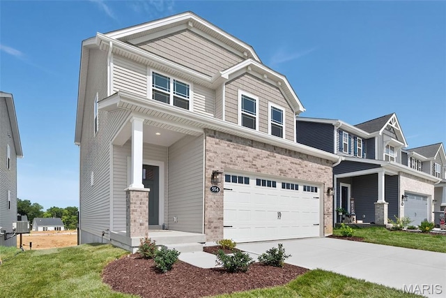 554 Wheatfield Cir, Ofallon, MO 63385 - craftsman-style house with a garage, concrete driveway, and a front lawn